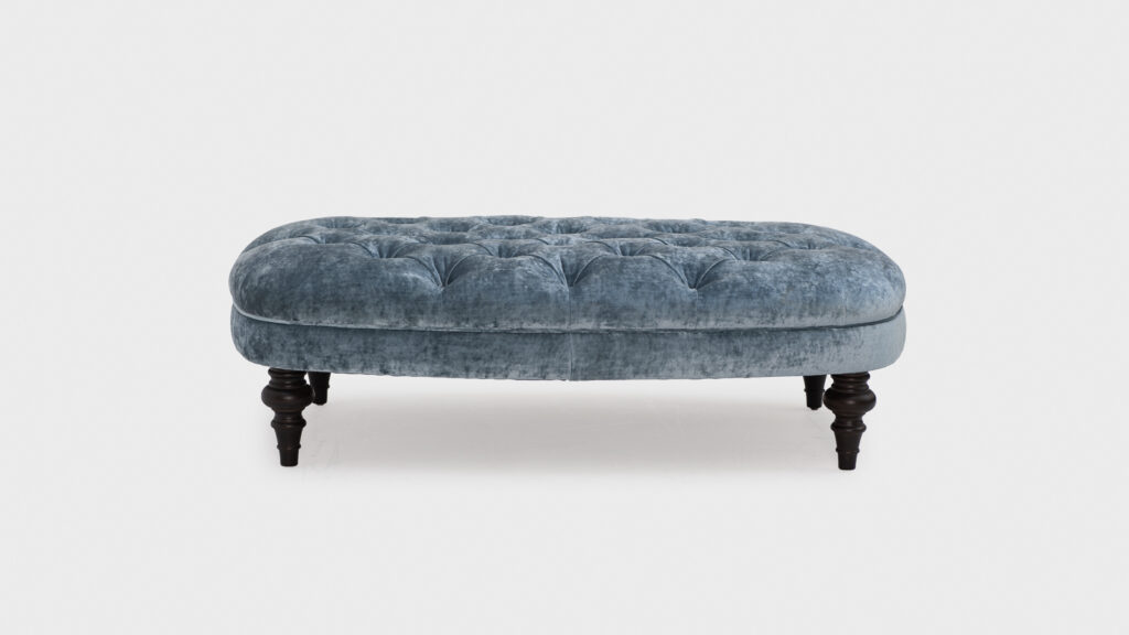 John Sankey Edith Blue Oval Footstool with indented top and polished feet - front
