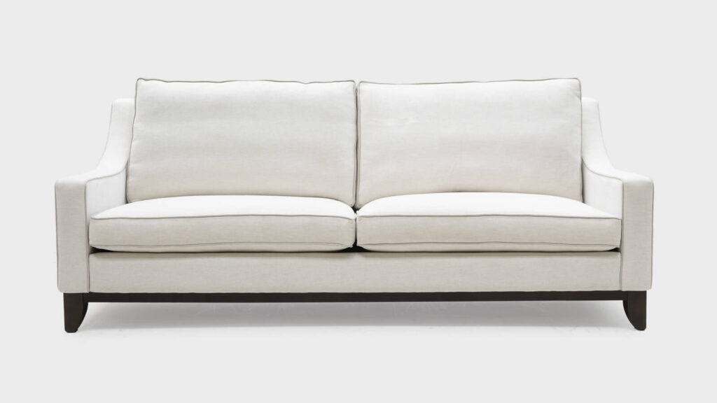 John Sankey Cream sofa with dark plinth - front