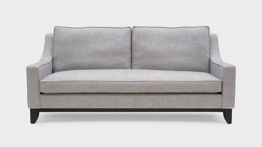 John Sankey Percival Large Sofa with single seat cushion and show wood plinth - front