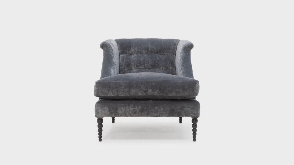 John Sankey grey velvet low compact chair with deep buttoning - front