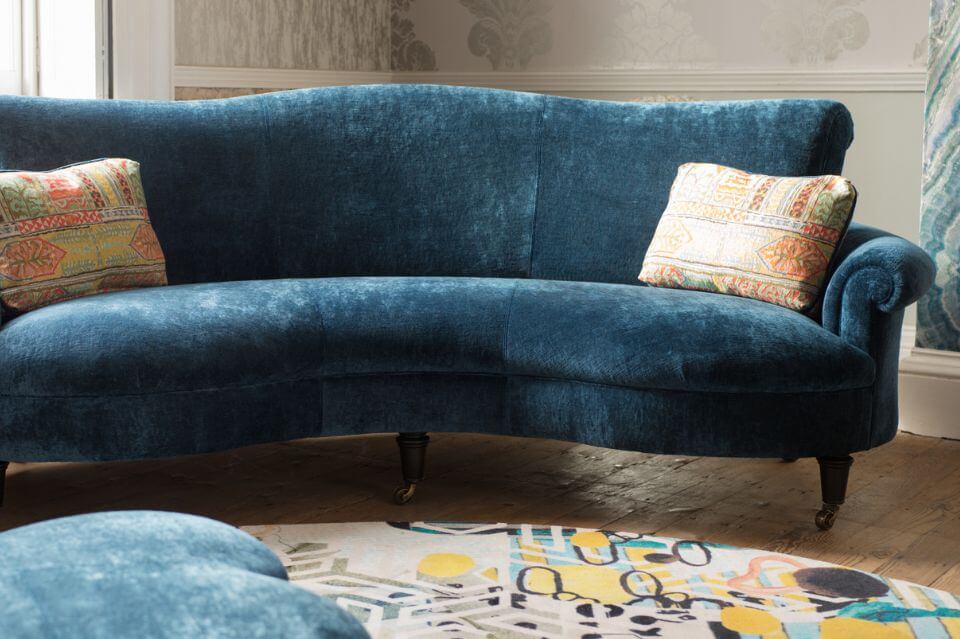 John Sankey Matilda curved blue velvet sofa