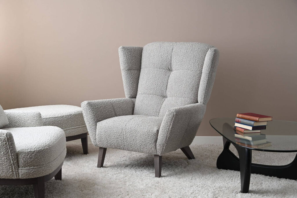 John Sankey Lars geometric chair covered in a cosy neutral boucle