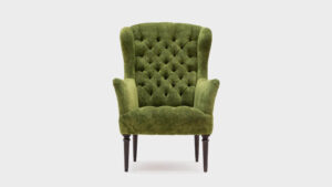 John Sankey Wainwright high backed chair in green velvet with button detail - front