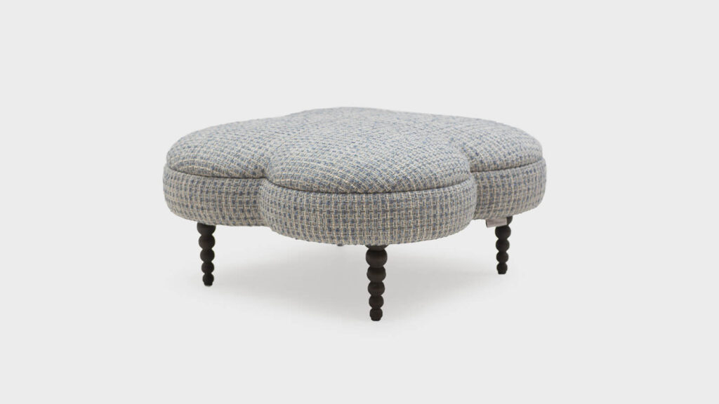John Sankey clover shaped small footstool with bobbin legs - front